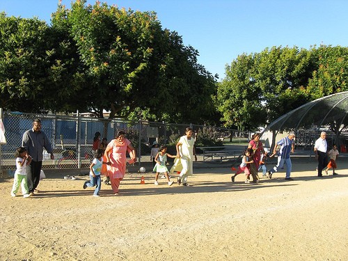Community members take part in outdoor games at KV Sports Day in 2008.