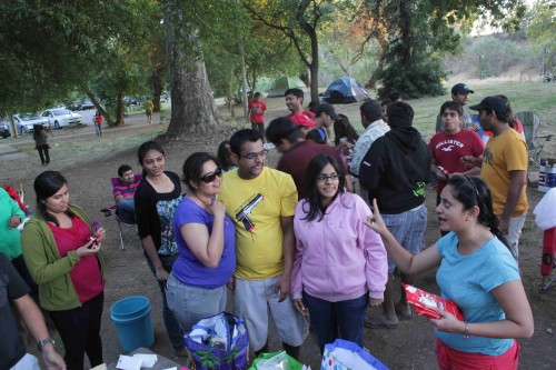 Community members share snacks and conversation at the 2013 camping gathering.
